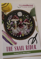 Snail Rider Cross Stitch Pattern by Tiny Modernist Nashville Needlework Market 2025